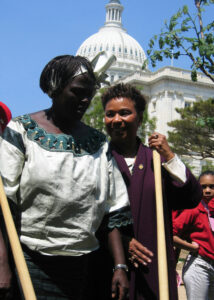Rep. Barbara Lee planting a tree in honor of Wangari Maathai