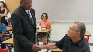 Rep. Elijah Cummings visits session at foreclosure prevention workshop (2012)