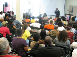 Rep. Elijah Cummings addresses attendees at foreclosure prevention workshop (2012)